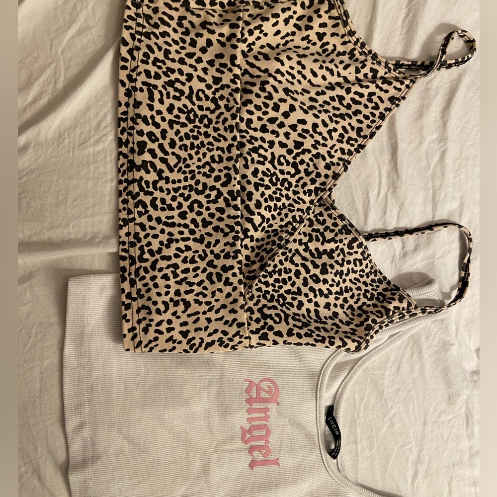 2 Shein tops. 1 tan cheetah print and 1 white with wording